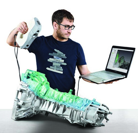 man using artec eva to scan gearbox